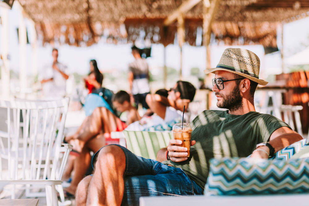A man enjoying a bistro near our Anna Maria Island  vacation rentals