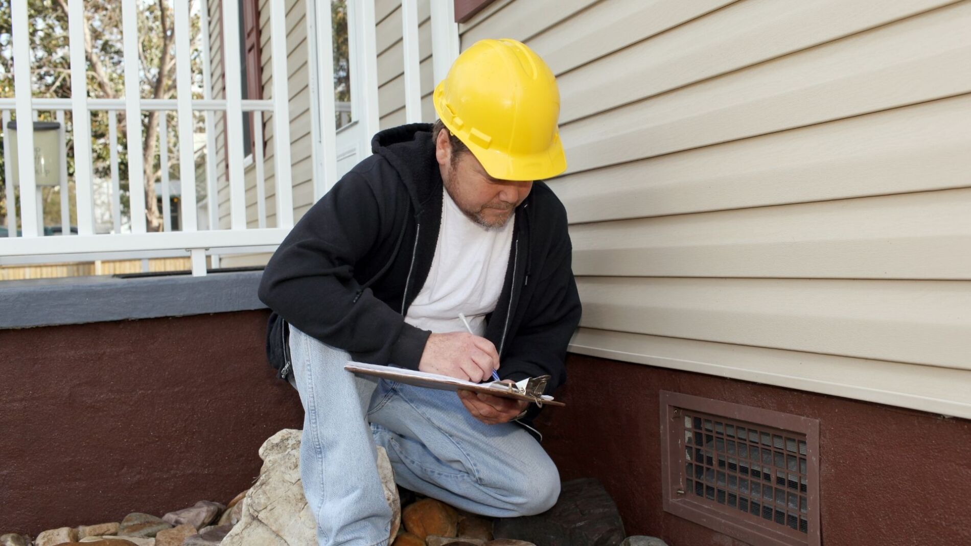 a home inspector in anna maria island looking at a home
