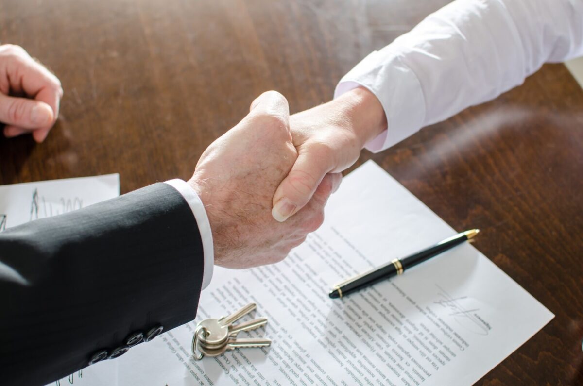 Signing on a house.